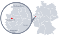 Diese Grafik zeigt eine Karte von Deutschland mit einer detaillierten Ansicht der Region Mülheim-Essen-Oberhausen. Mülheim-Essen-Oberhausen ist in Rot hervorgehoben und liegt im westlichen Teil Deutschlands. Ein Lupensymbol vergrößert diesen Bereich, um die Lage genauer darzustellen.