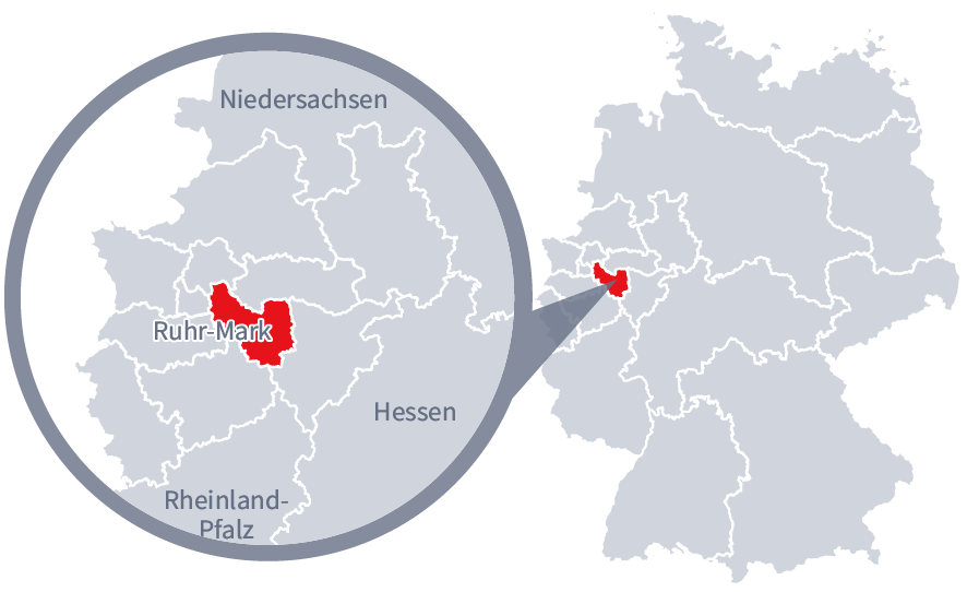 Diese Grafik zeigt eine Karte von Deutschland mit einer detaillierten Ansicht der Region Ruht-Mark. Ruht-Mark ist in Rot hervorgehoben und liegt im westlichen Teil Deutschlands. Ein Lupensymbol vergrößert diesen Bereich, um die Lage genauer darzustellen.